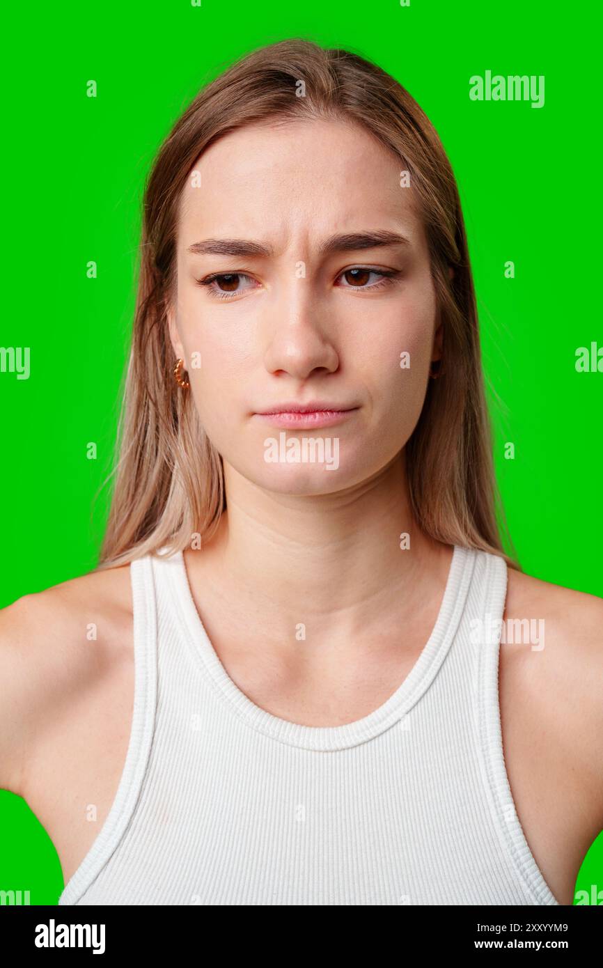 Woman wearing green tank top hi-res stock photography and images - Alamy