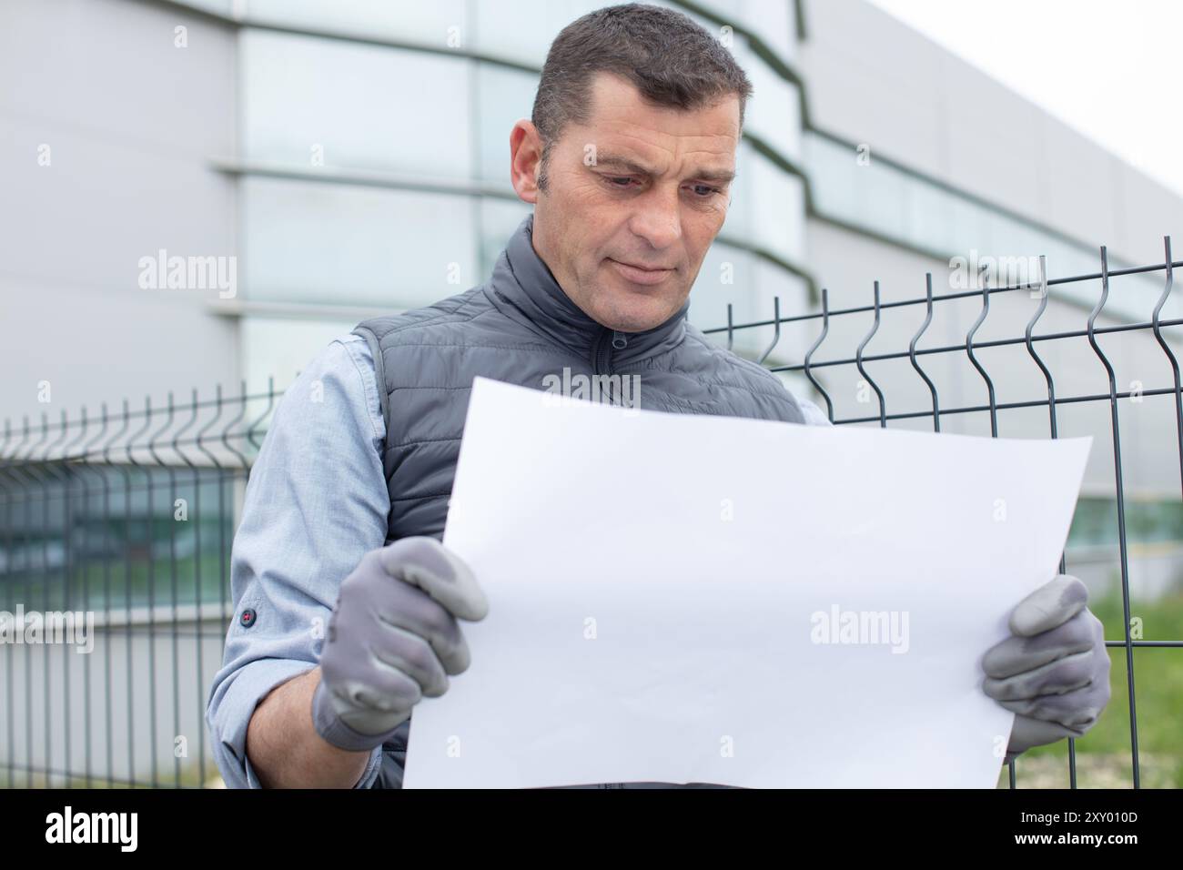 engineer specialist checking a construction plan Stock Photo - Alamy