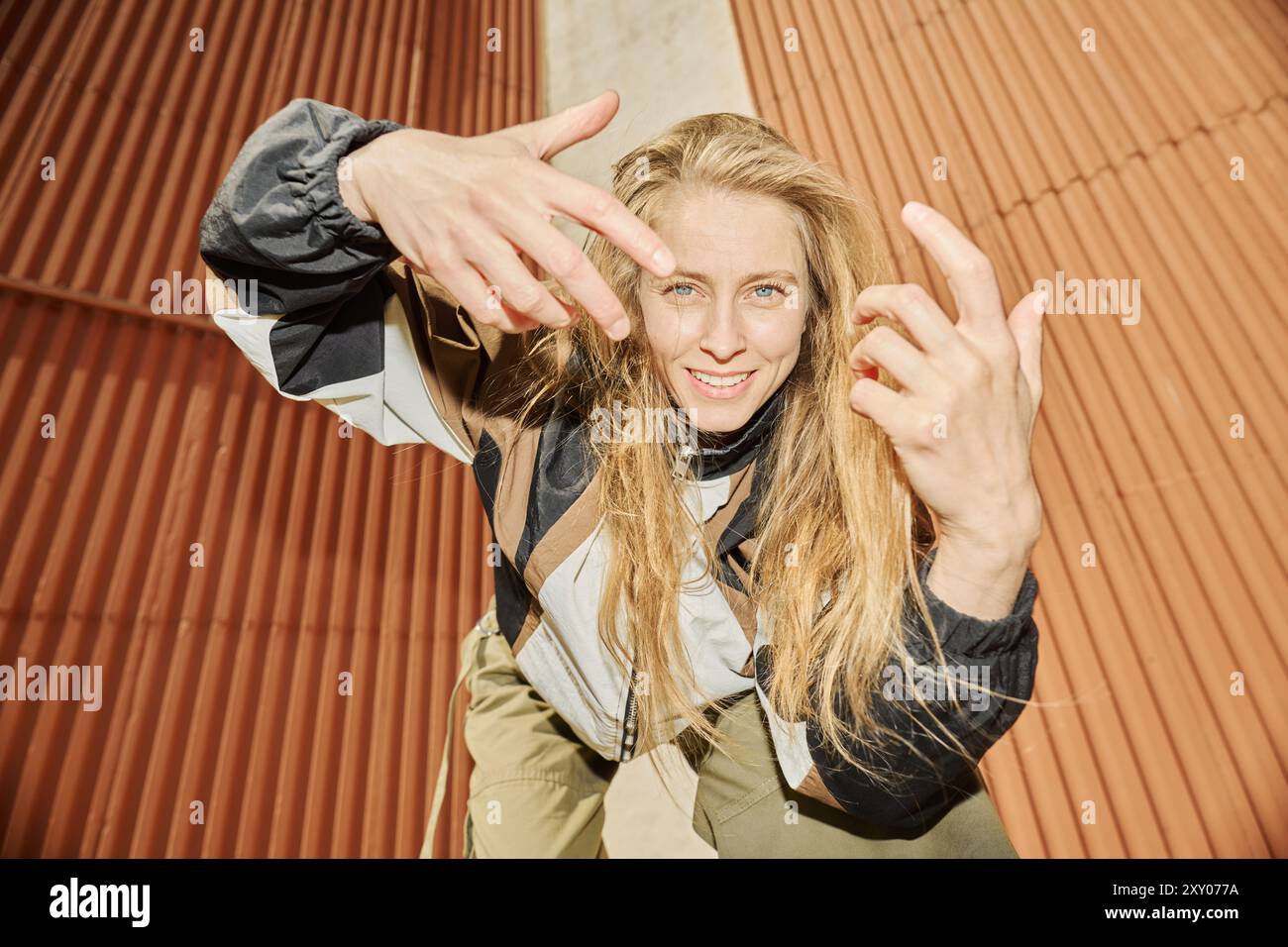 Happy woman smiling outdoors in hi-res stock photography and images - Alamy
