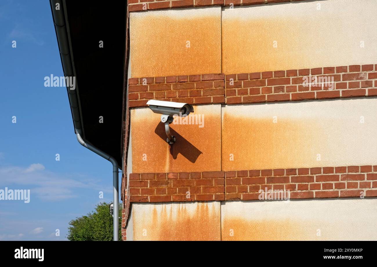 Surveillance camera on building with copy space Stock Photo