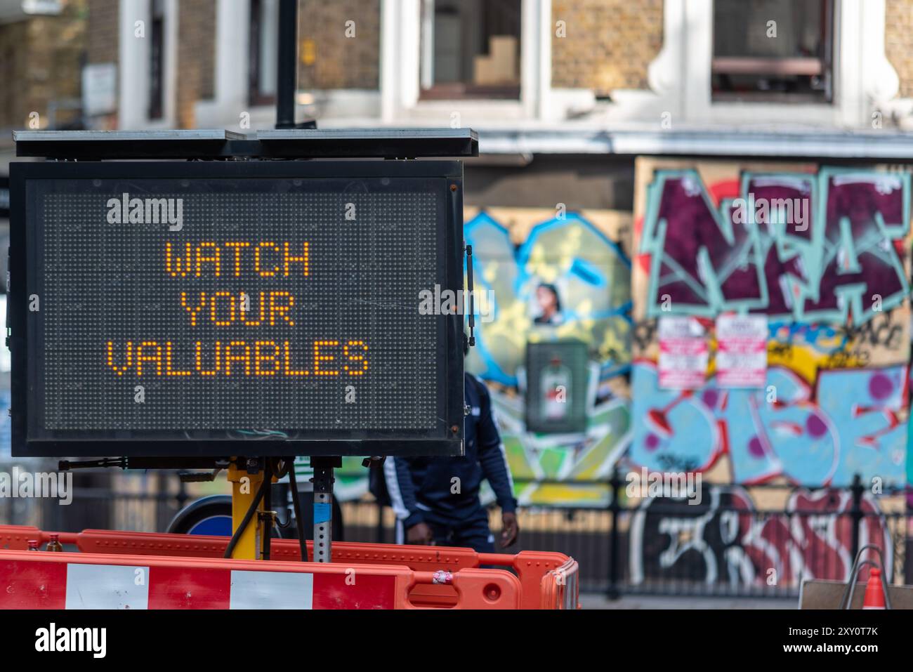 Safety warning at the Notting Hill Carnival Grand Parade 2024. Adult's Day on Bank Holiday Monday. Stock Photo