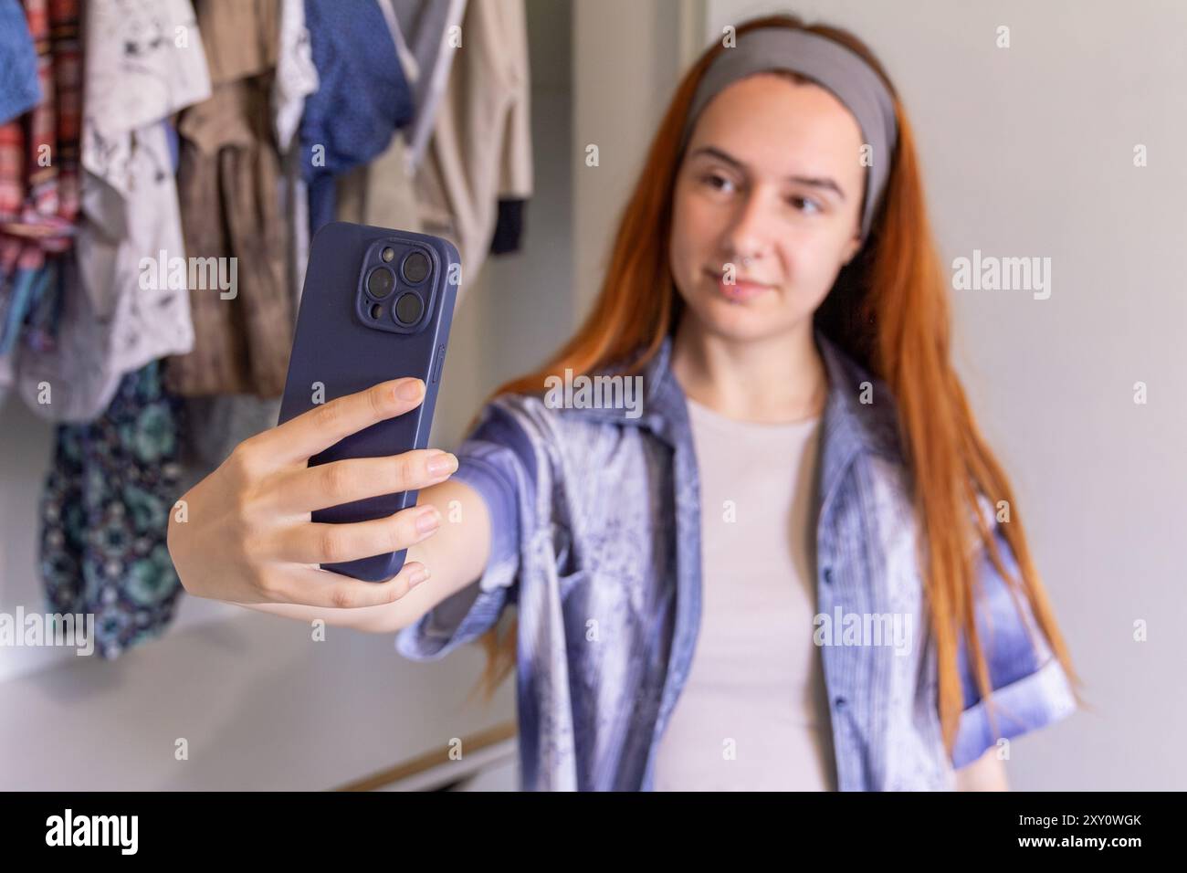Red camera consumerism hi-res stock photography and images - Alamy