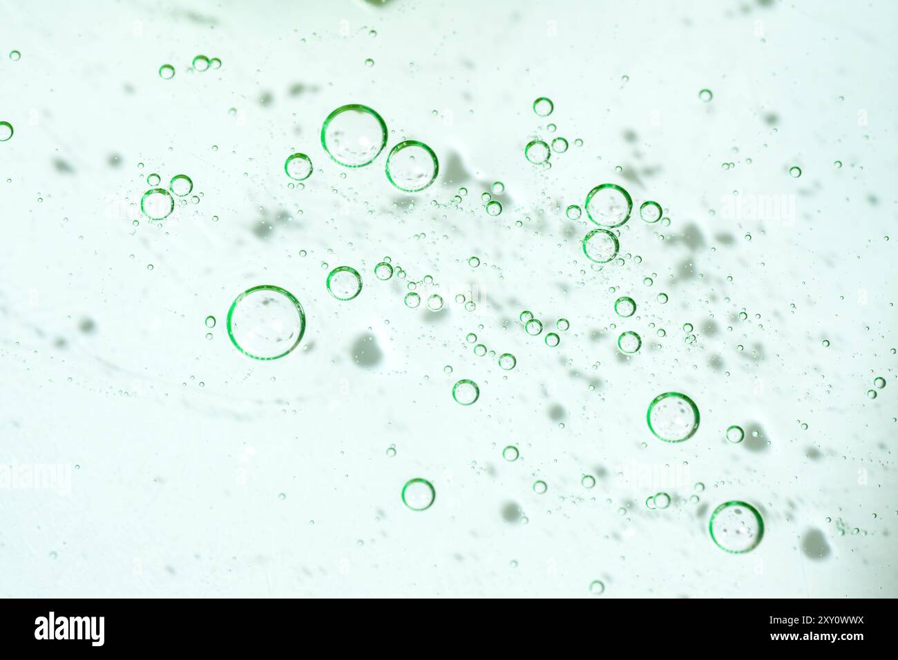 A close-up view of aloe vera gel exhibiting vibrant green suspended bubbles,  ideal for cosmetic and skincare themes Stock Photo - Alamy