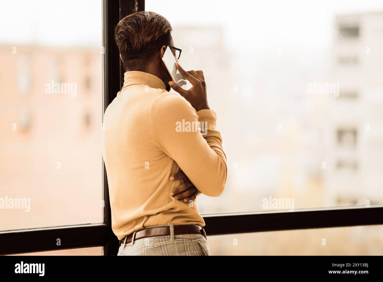 Unrecognizable afro man talking on the phone Stock Photo