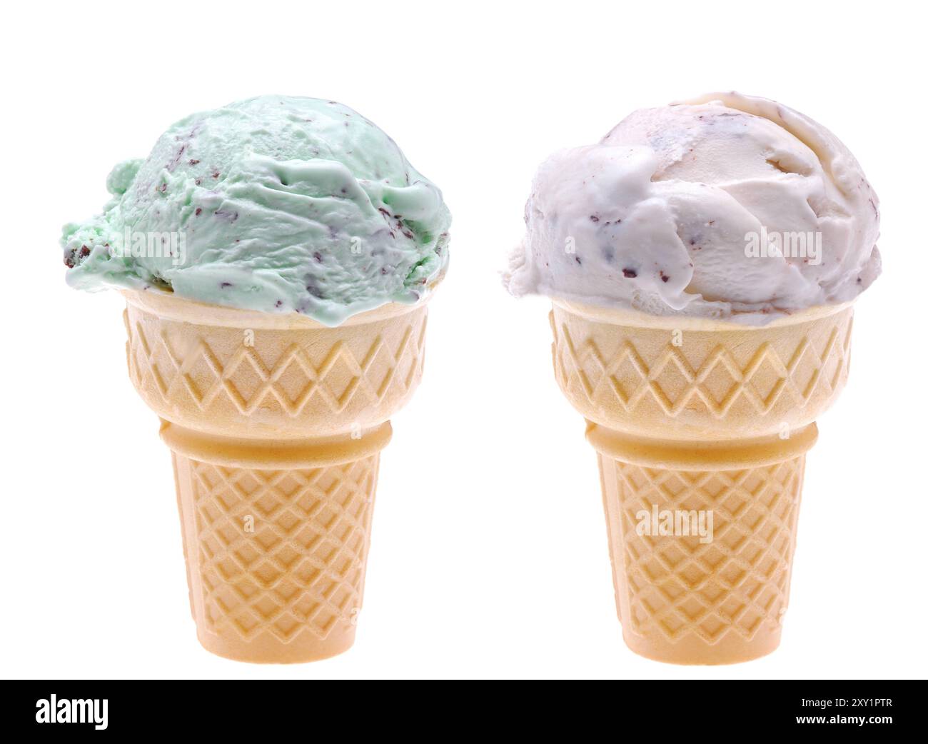 A chocolate chip ice cream cone and a mint chip cone isolated over white. A single scoop of each flavor in a waffle style cone. Stock Photo