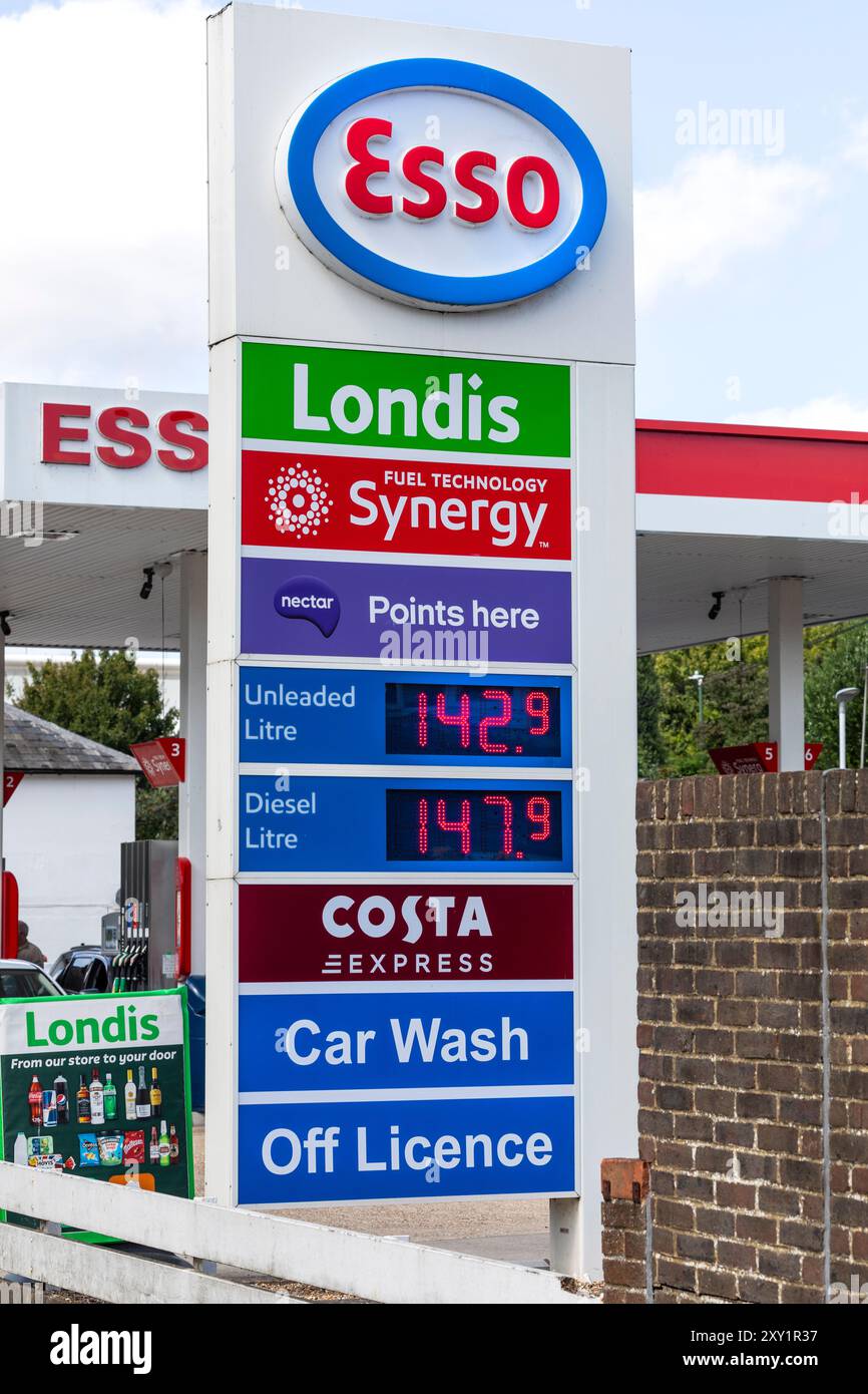 An Esso petrol station fuel price sign. Stock Photo