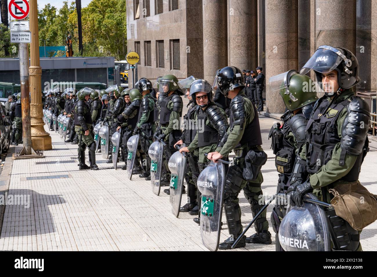 Riot police of the Argentine National Gendarmerie prepare to keep the ...
