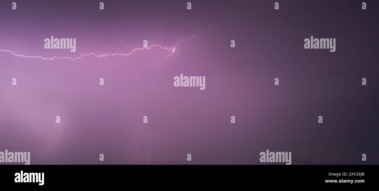 Shot of the lightning in the night sky Stock Photo - Alamy