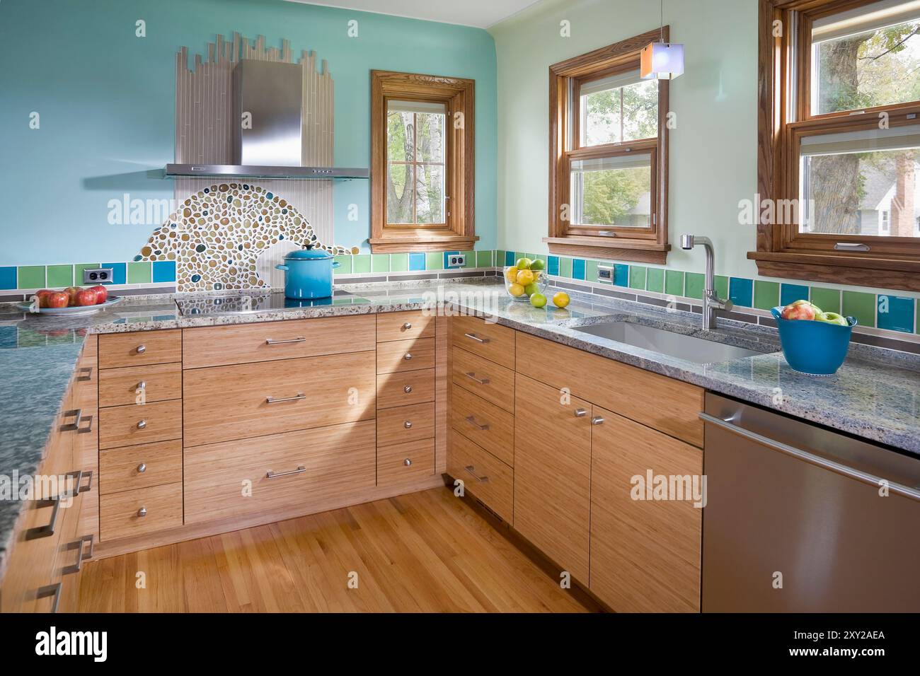 Cabinets and stove in colorful kitchen Stock Photo - Alamy