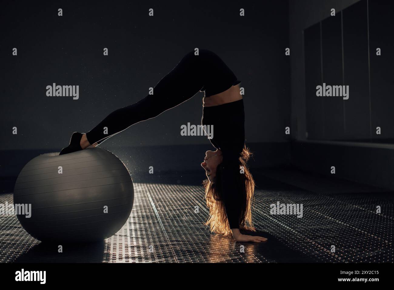 Young yogi woman stretching hi-res stock photography and images - Alamy