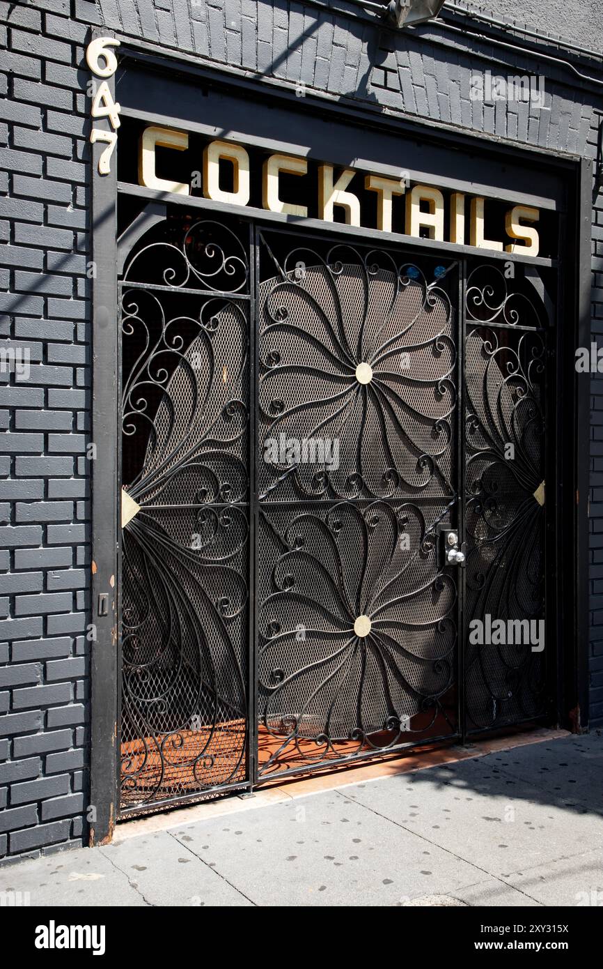 The Mission District in San Francisco, California is the most colorful neighborhood in The City. Bar at the corner of Valencia and 17th. - Stock Image