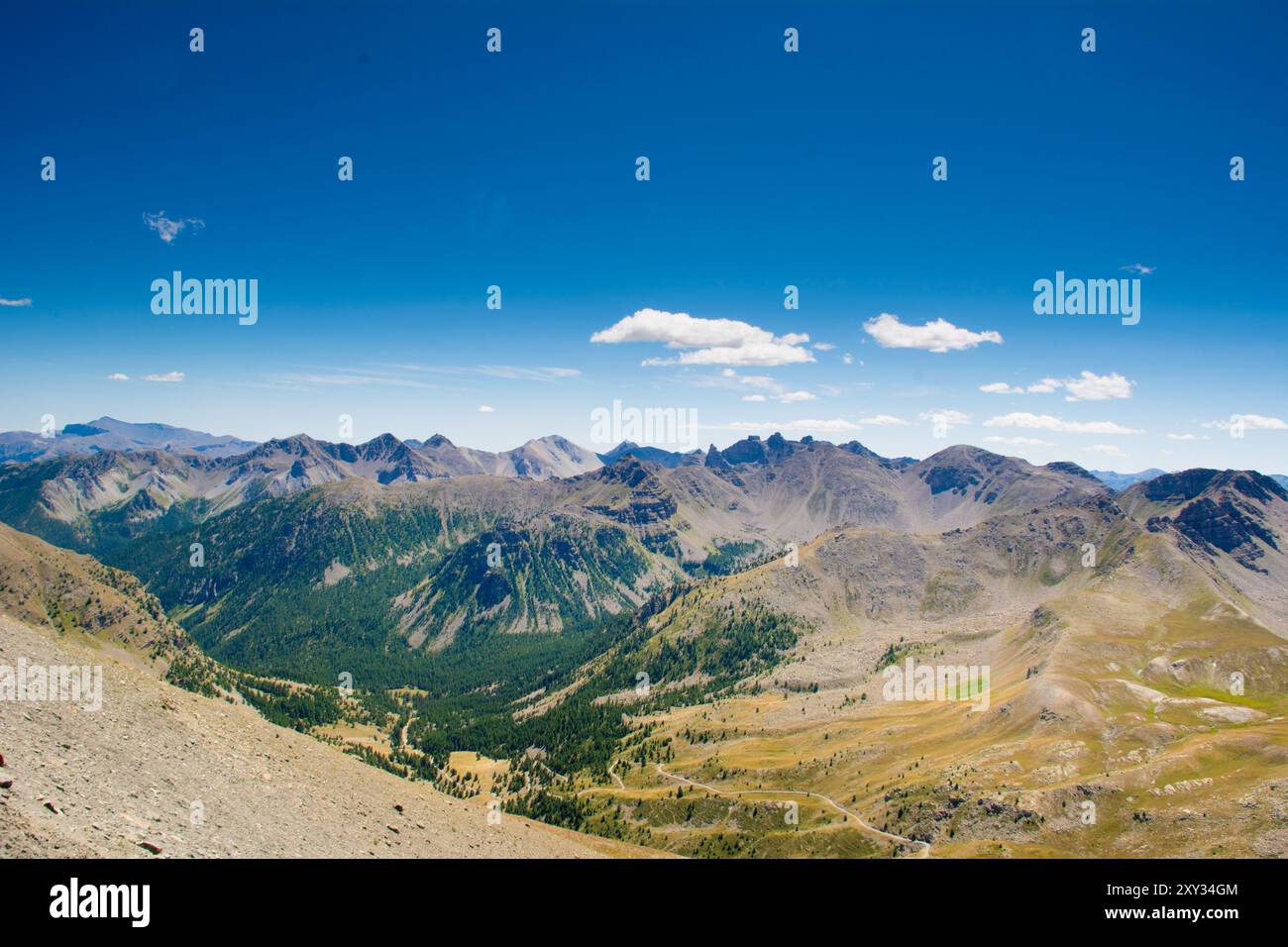 Mountain landscape with clear blue sky and clouds Stock Photo - Alamy