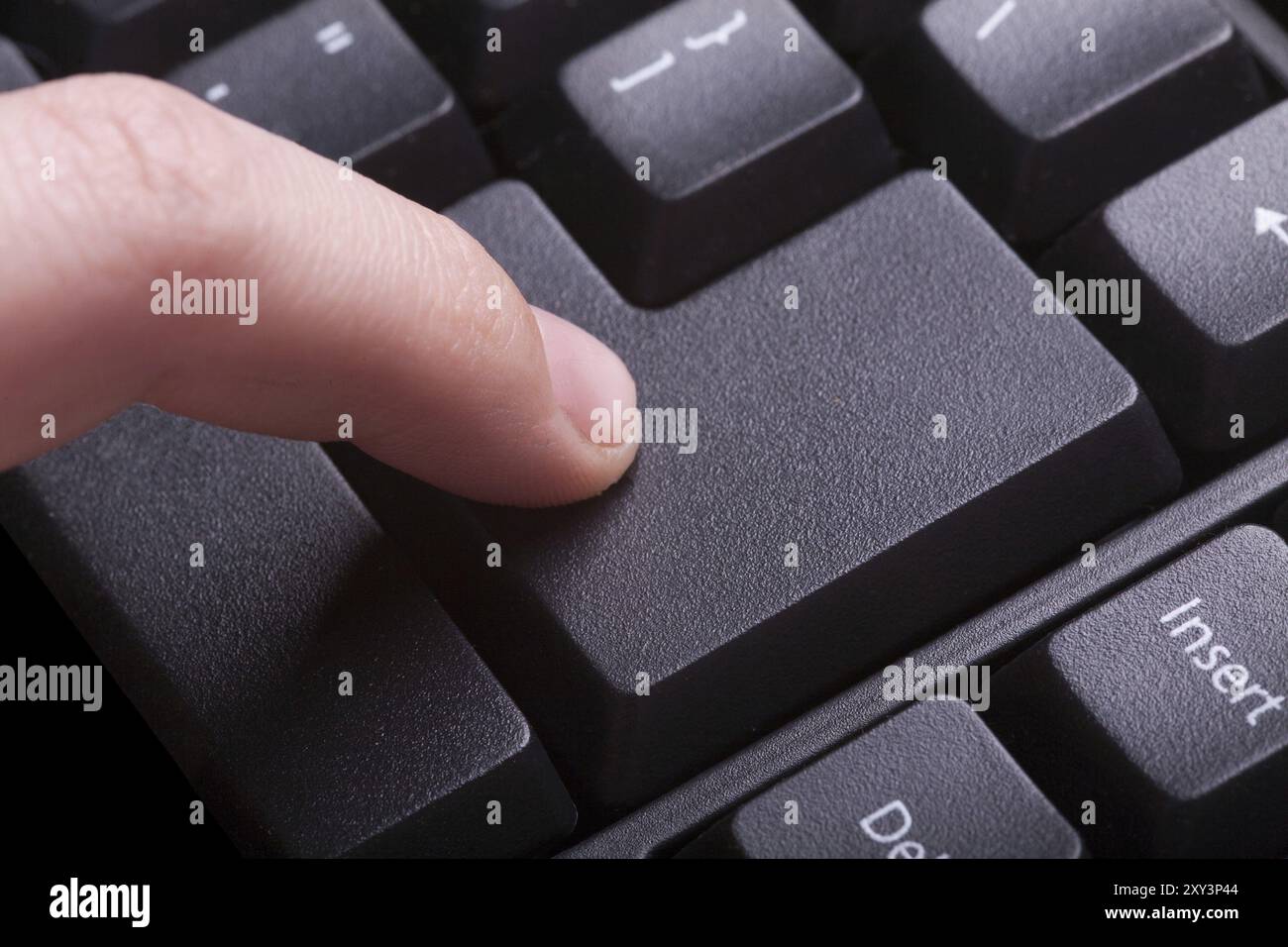 Female hand using computer keyboard, enter button Stock Photo - Alamy