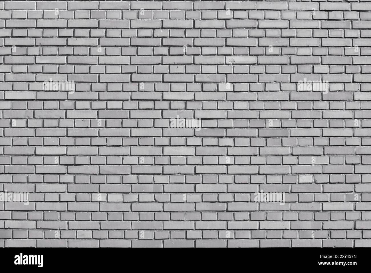 Quiet gray colored brick wall background Stock Photo