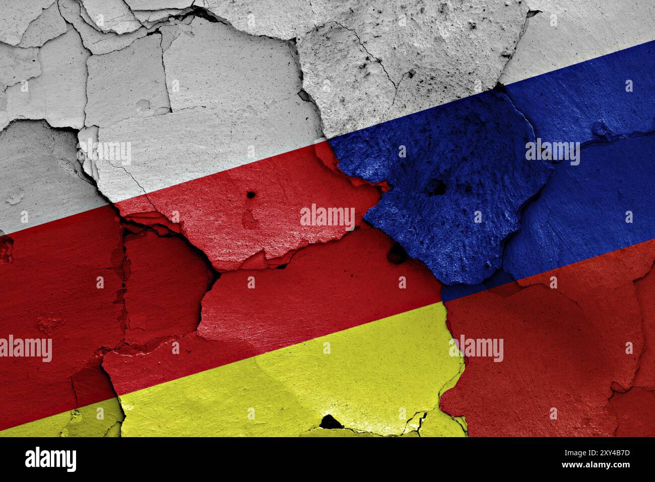 Flags of North Ossetia-Alania and Russia painted on cracked wall Stock ...