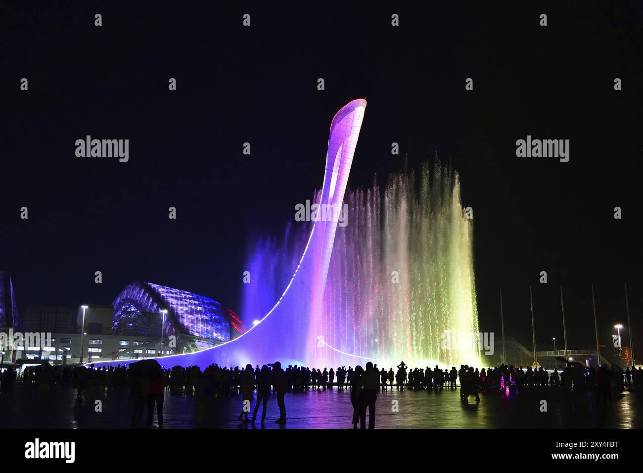 Sochi, Russia, May 29. 2018. Bowl of the Olympic flame Firebird and singing Fountain in the Olympic park in the evening. The main symbol of the Olympi Stock Photo