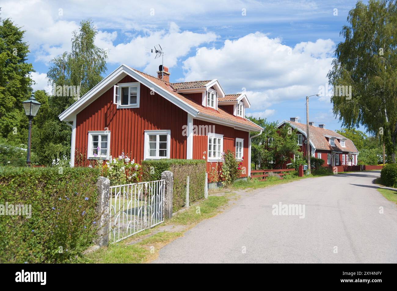 View of a street in the idyllic village of Pataholm on the Swedish coast of the Baltic Sea Stock Photo