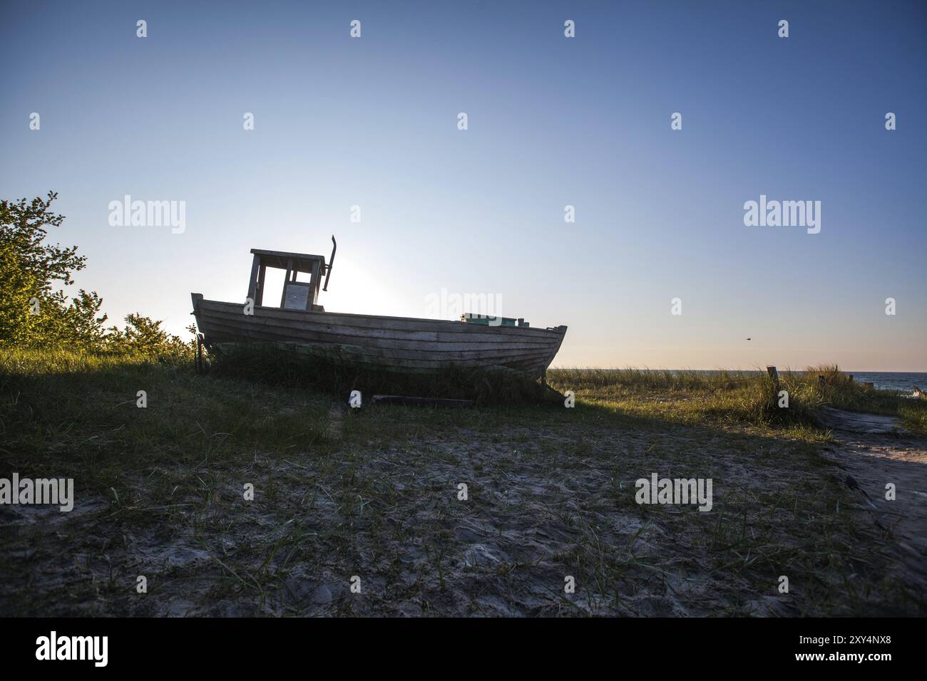 Old wooden shipwreck lying on the beach Stock Photo - Alamy