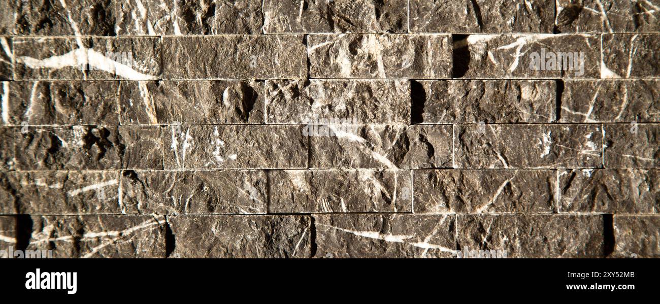 Rectangular cut out black white and grey organic marble wall texture background can be, tile seamless lined up Stock Photo
