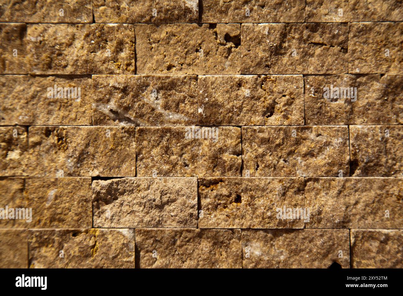 Rectangular cut out beige organic marble wall texture background can be, tile seamless lined up Stock Photo