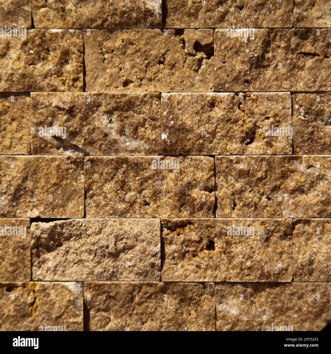 Rectangular cut out beige organic marble wall texture background can be, tile seamless lined up Stock Photo