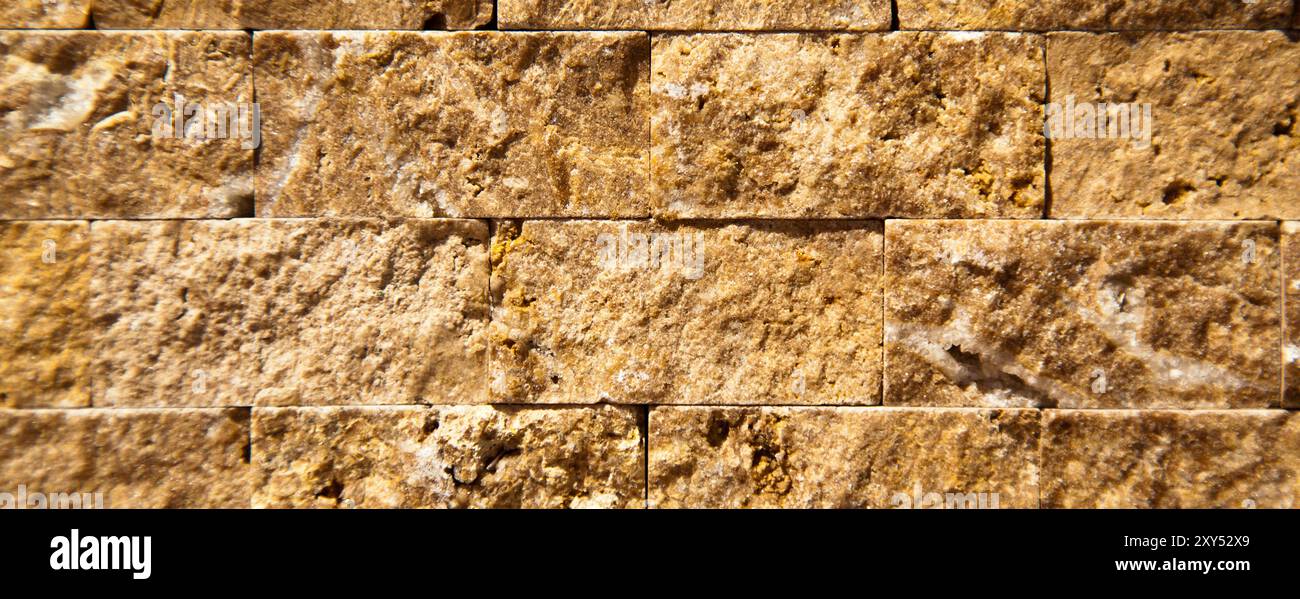 Rectangular cut out beige organic marble wall texture background can be, tile seamless lined up Stock Photo
