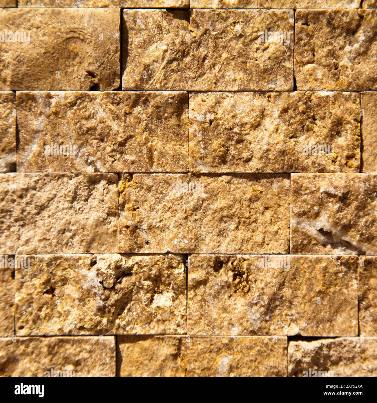 Rectangular cut out beige organic marble wall texture background can be, tile seamless lined up Stock Photo