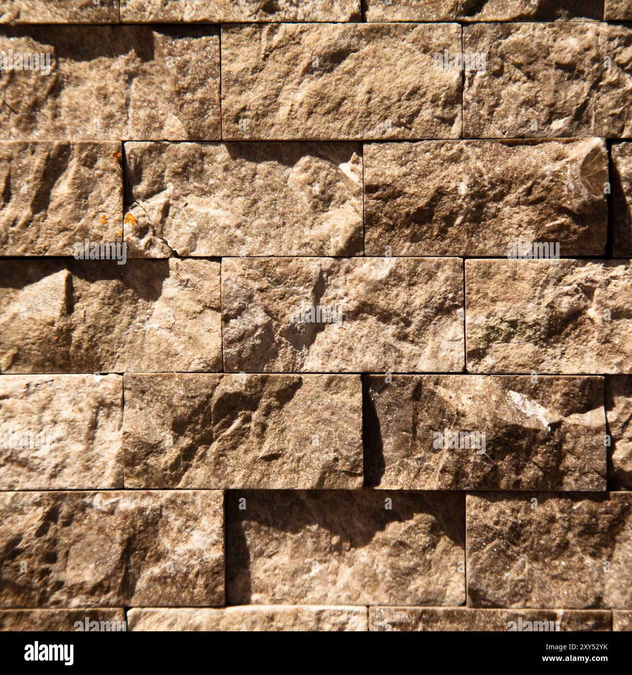 Rectangular cut out beige organic marble wall texture background can be, tile seamless lined up Stock Photo