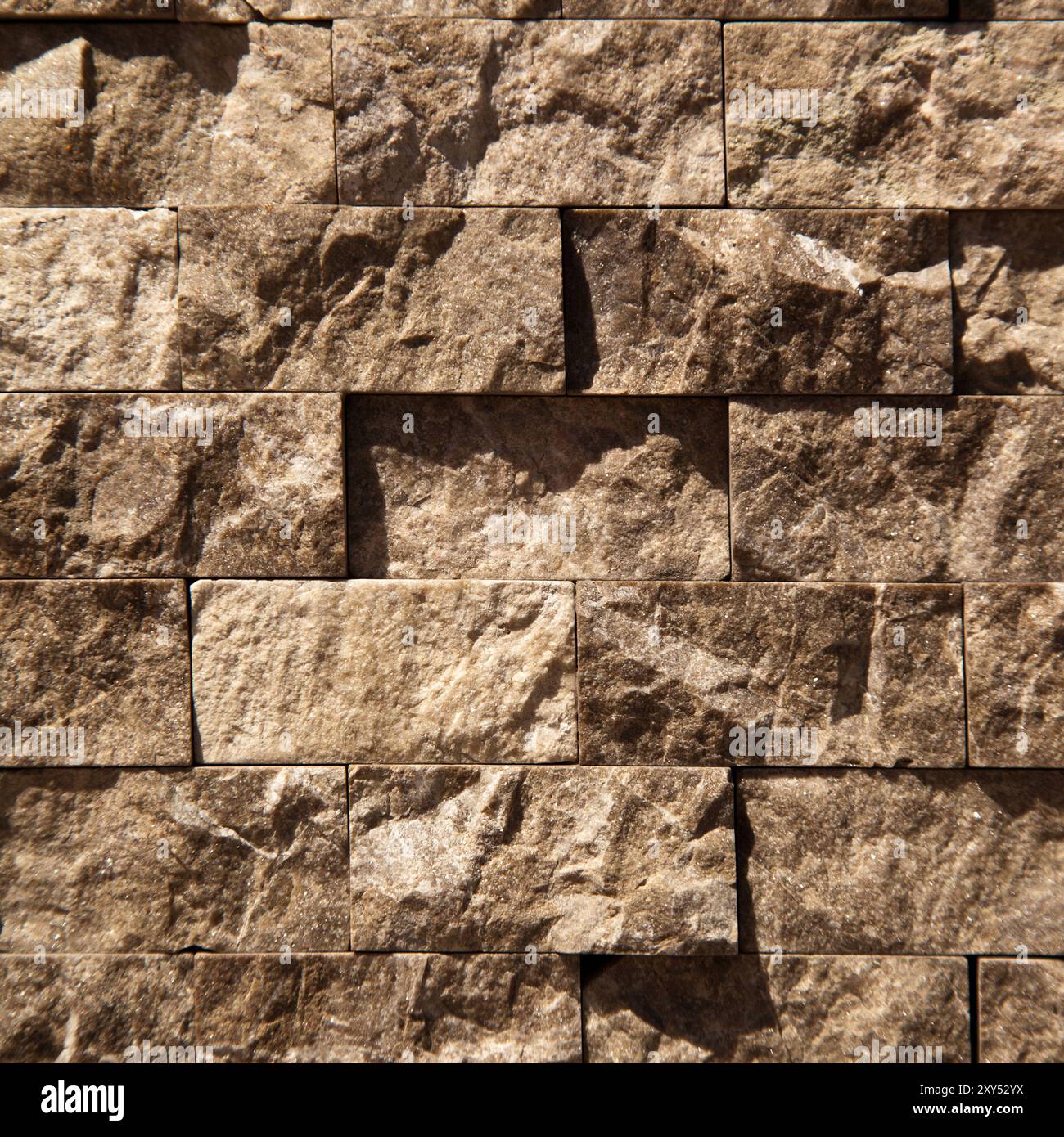 Rectangular cut out beige organic marble wall texture background can be, tile seamless lined up Stock Photo