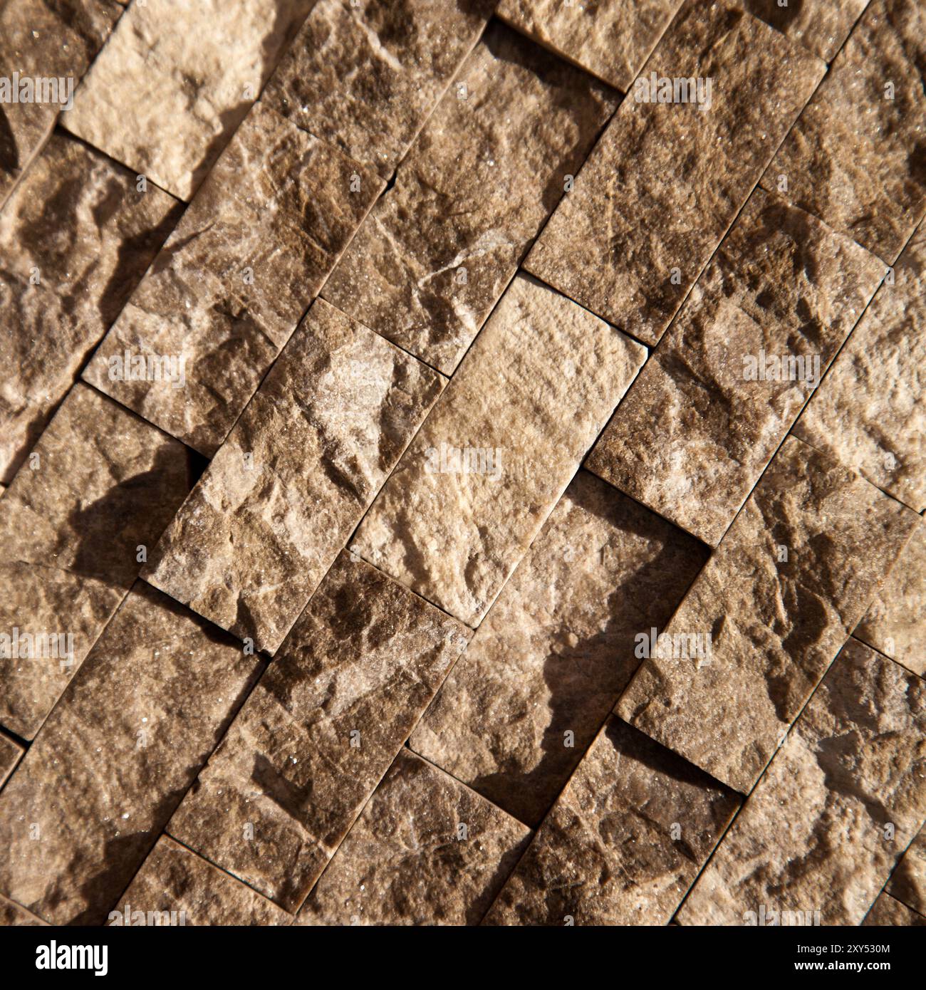 Rectangular cut out beige organic marble wall texture background can be, tile seamless lined up Stock Photo