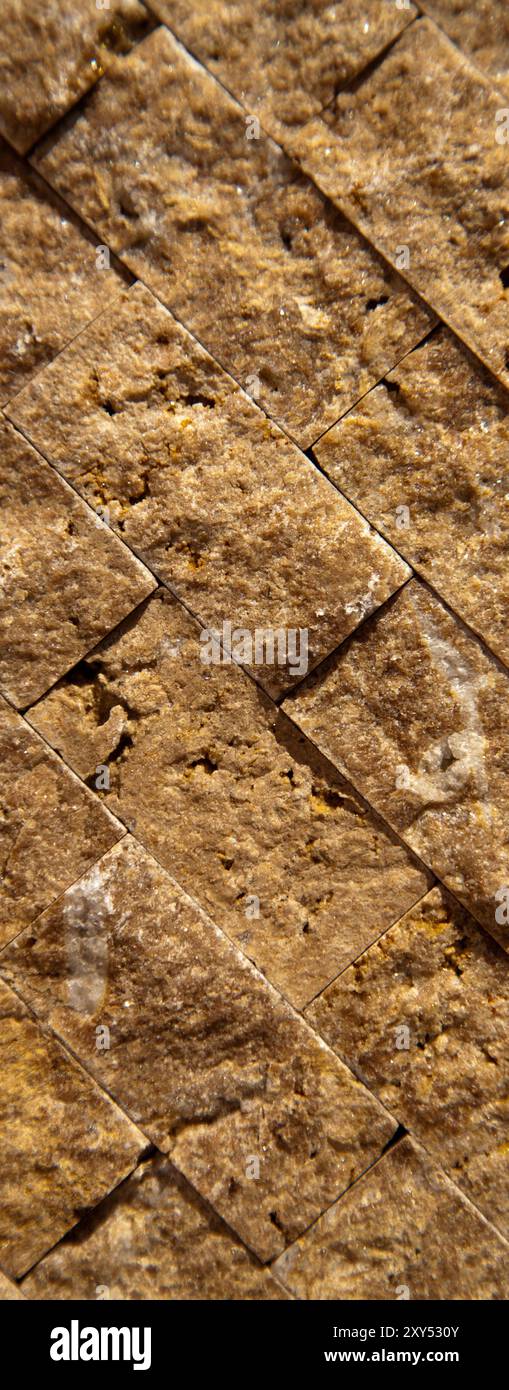 Rectangular cut out beige organic marble wall texture background can be, tile seamless lined up Stock Photo