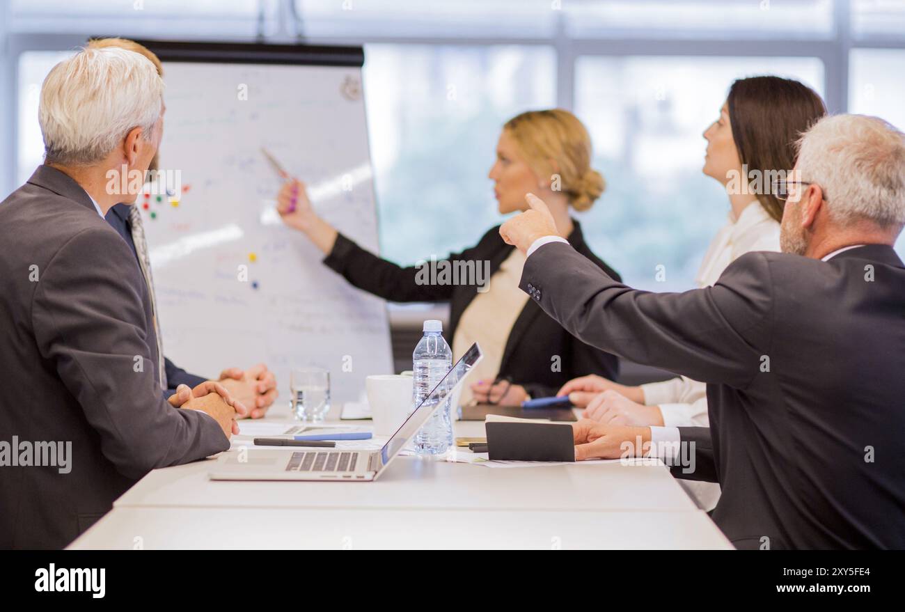 Businessman presenting new project partners office Stock Photo