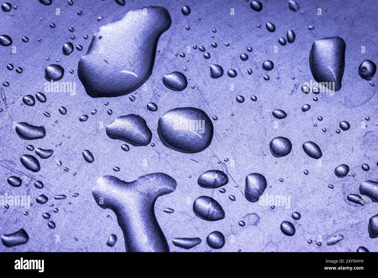 Macro picture of water drops on a metal surface Stock Photo - Alamy