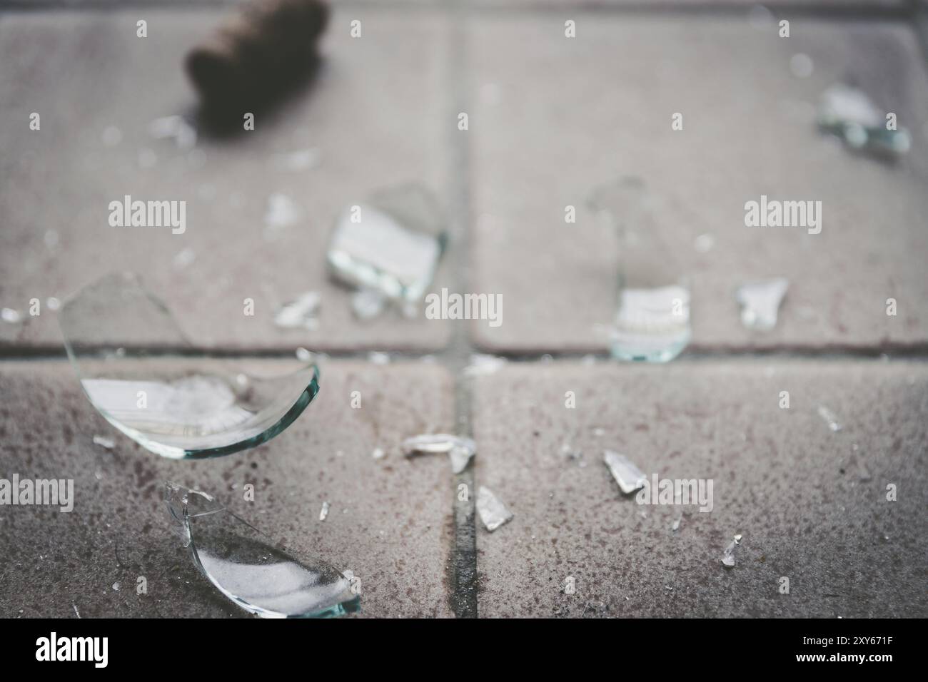 Piece of broken glass on the floor, wine bottle Stock Photo