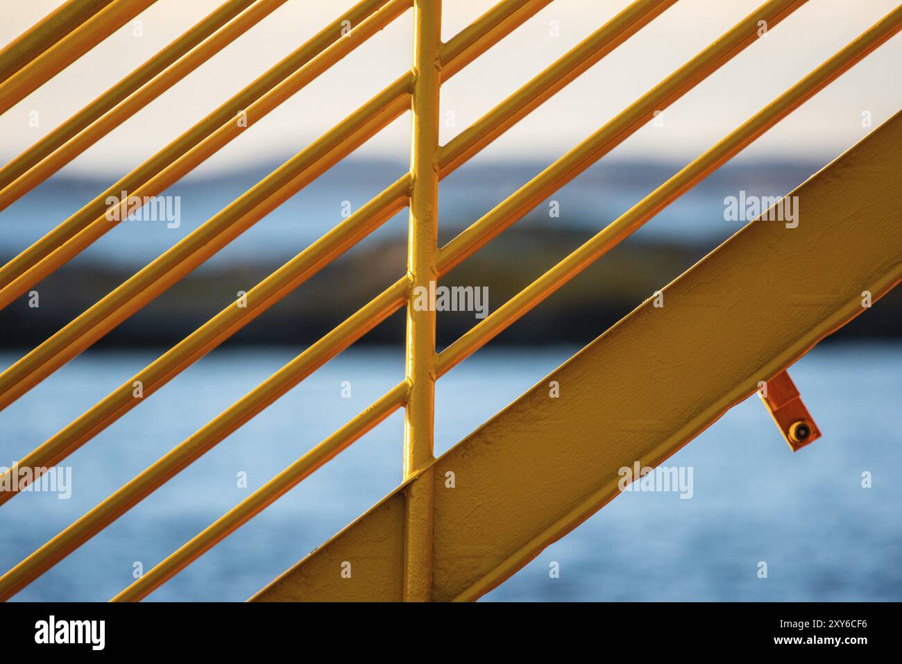 Yellow metal hand railings on a ferry Stock Photo - Alamy