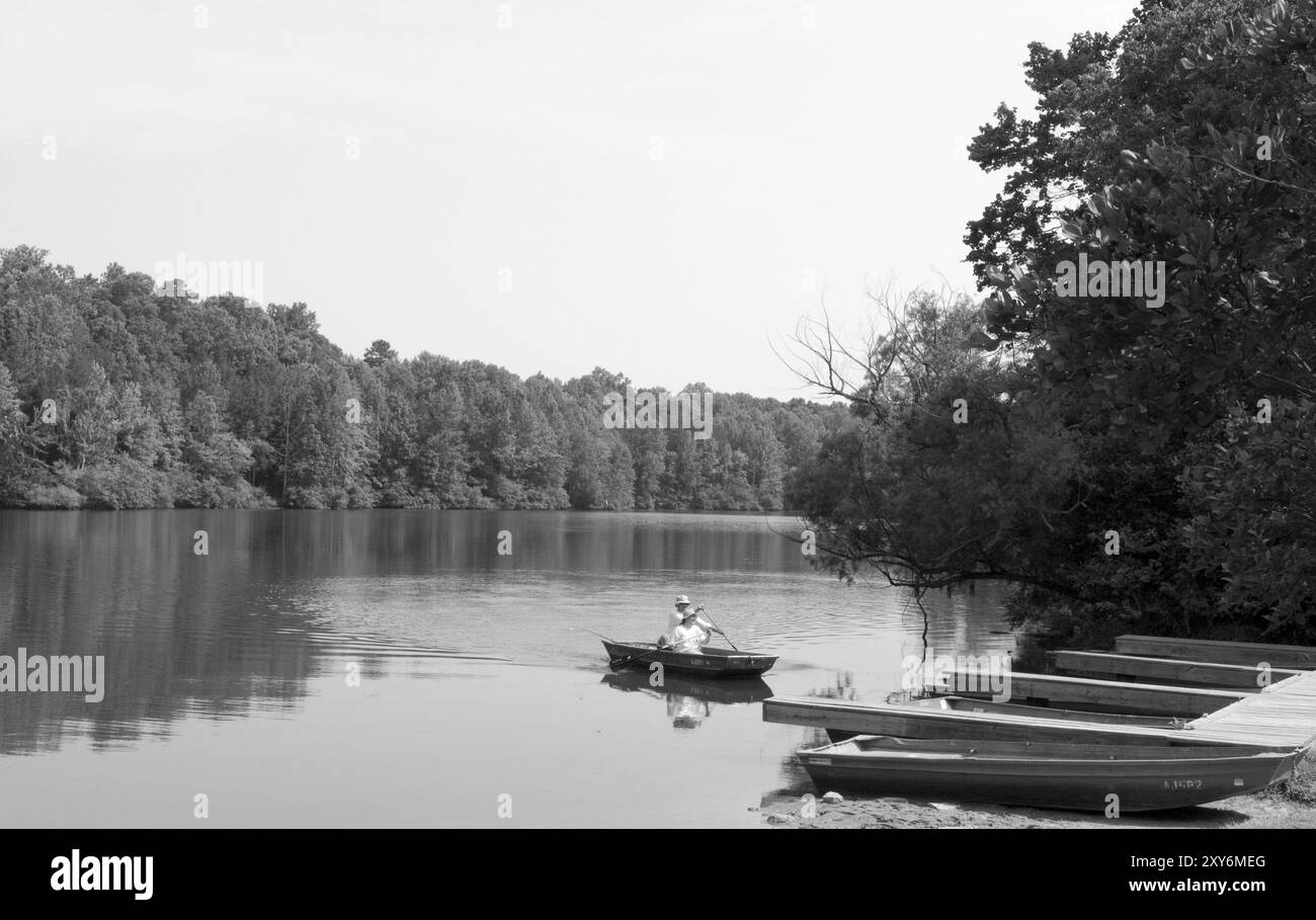 Couple in rowing boat Black and White Stock Photos & Images - Alamy