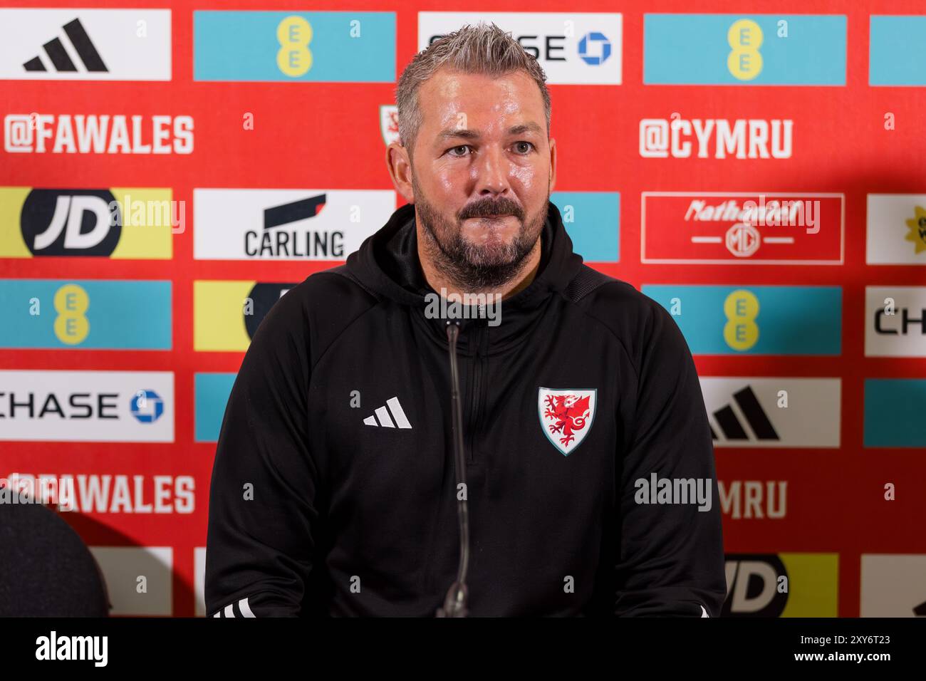 CARDIFF, UK. 28th Aug, 2024. Wales U21 National Team Manager Matty ...