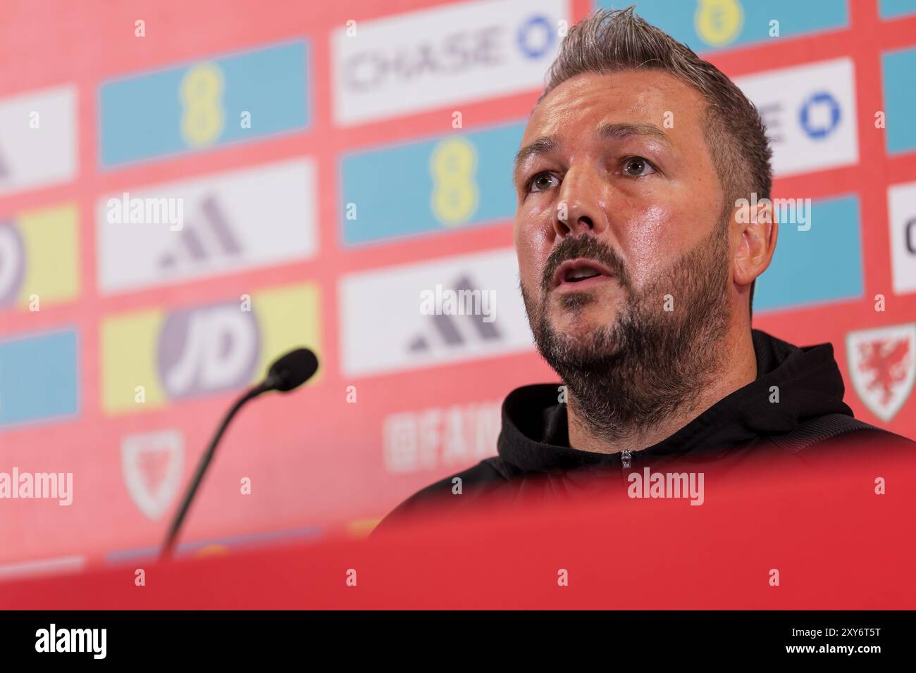 CARDIFF, UK. 28th Aug, 2024. Wales U21 National Team Manager Matty ...