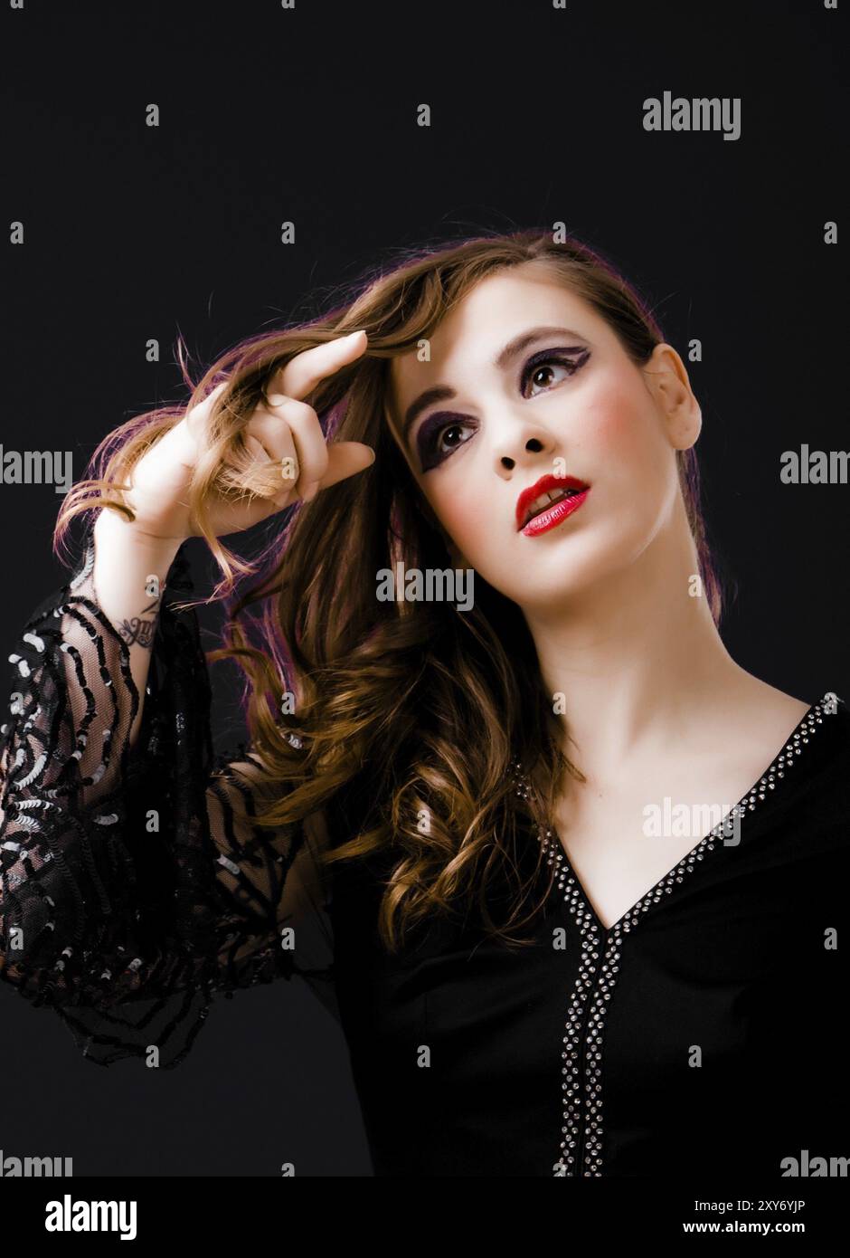 Portrait of a beautiful young woman with long brown hair Stock Photo ...