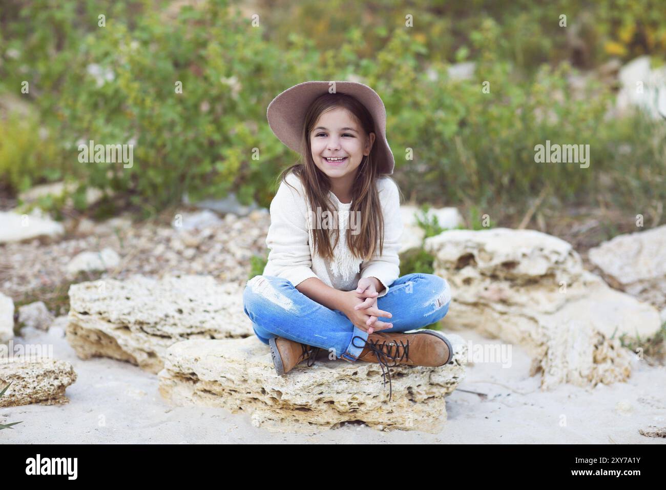 Portrait of the happy little girl outdoors Stock Photo - Alamy