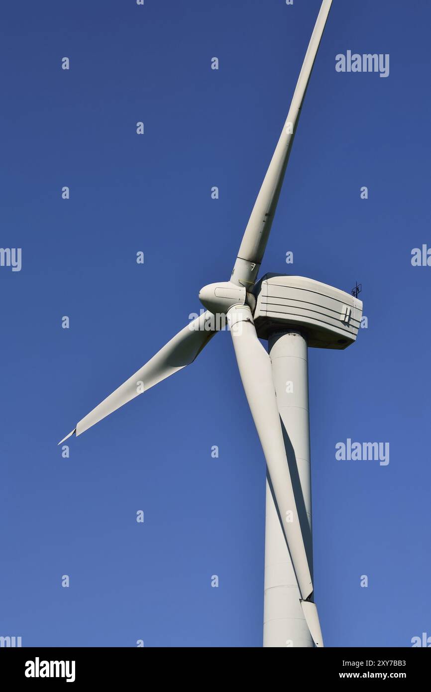 Wind turbine closeup on the blue sky background Stock Photo - Alamy