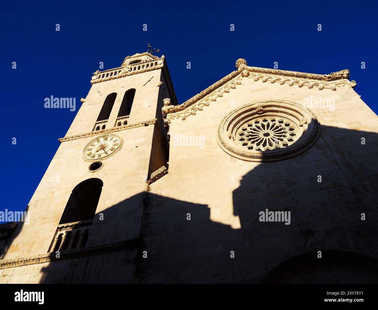 St Marks Cathedral lit by the setting sun in the Old Town Korcula Town Korcula Dalmatia Croatia Stock Photo