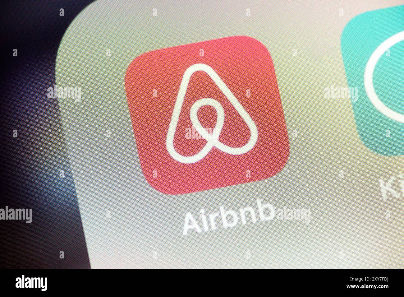 OSTRAVA, CZECHIA - JULY 27, 2024: Airbnb mobile app icon on electronic device screen, application can be used to book accommodation Stock Photo