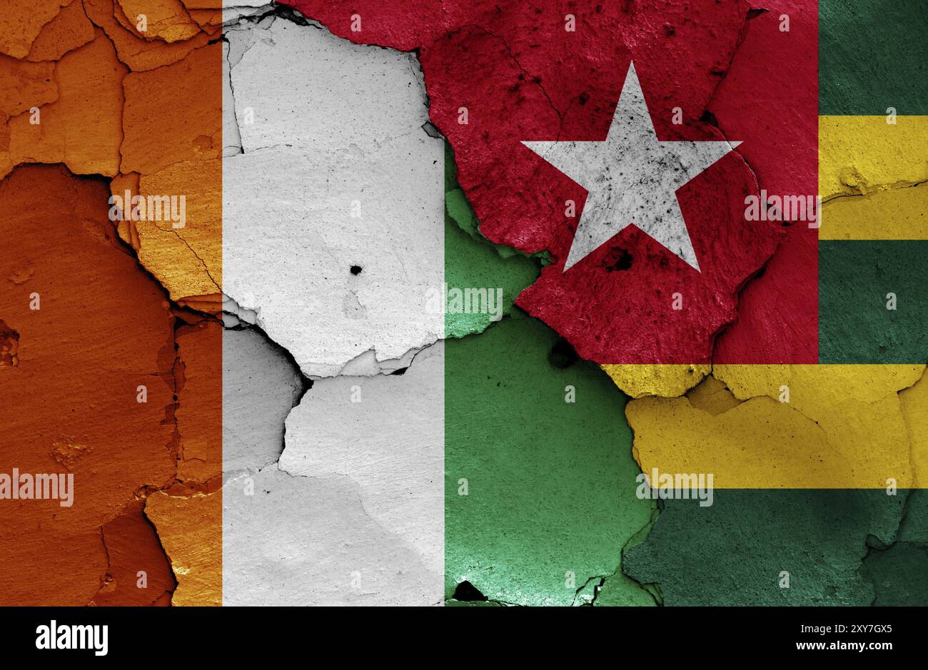 Flags of Ivory Coast and Togo painted on cracked wall Stock Photo - Alamy