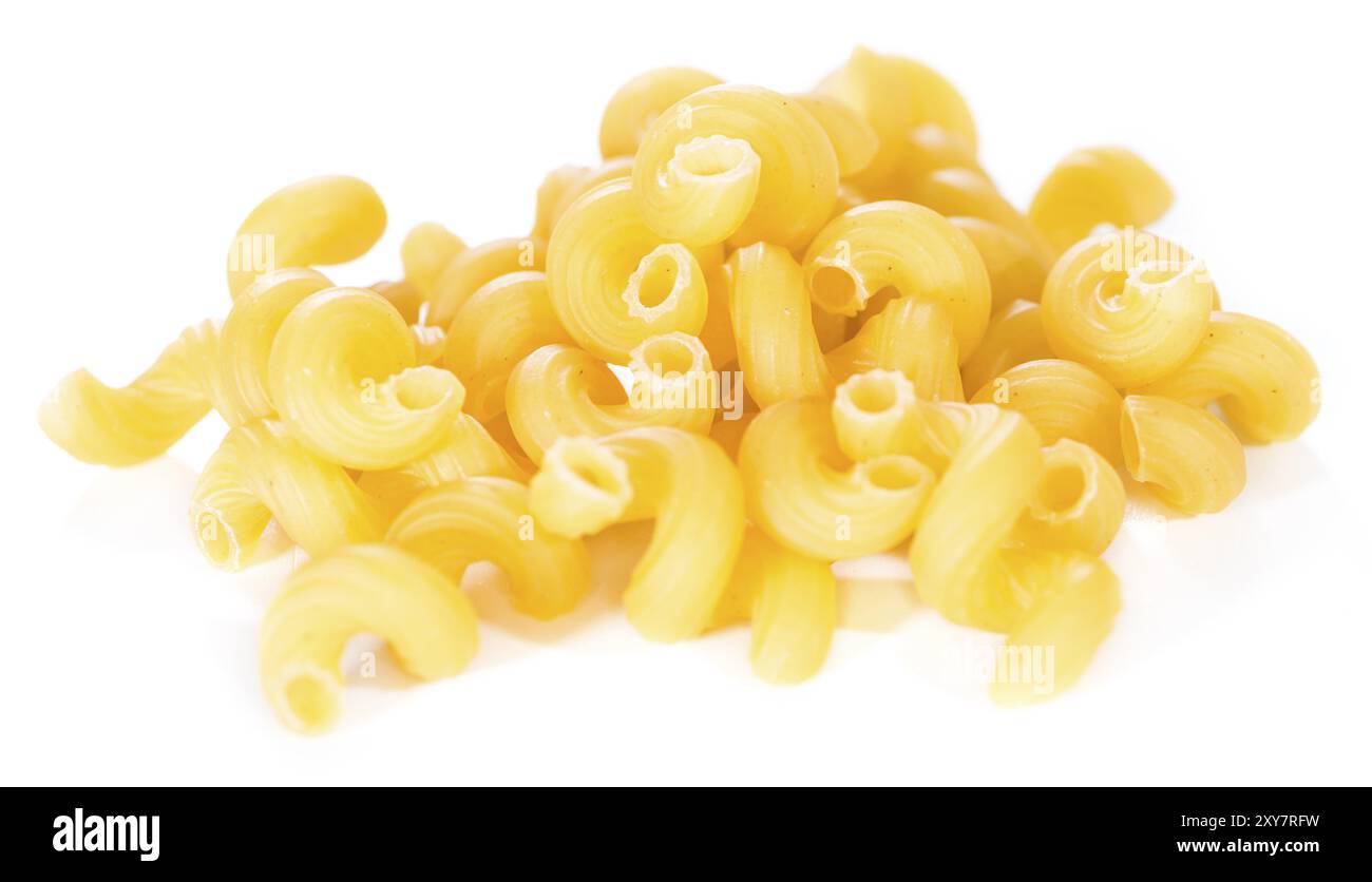 Pasta Curls (raw) isolated on pure white background Stock Photo