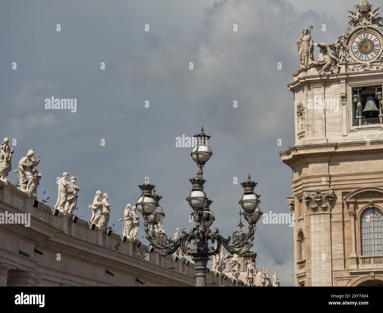 Tower Statue Rome Clock tower and lantern with several statues on an architectural ...