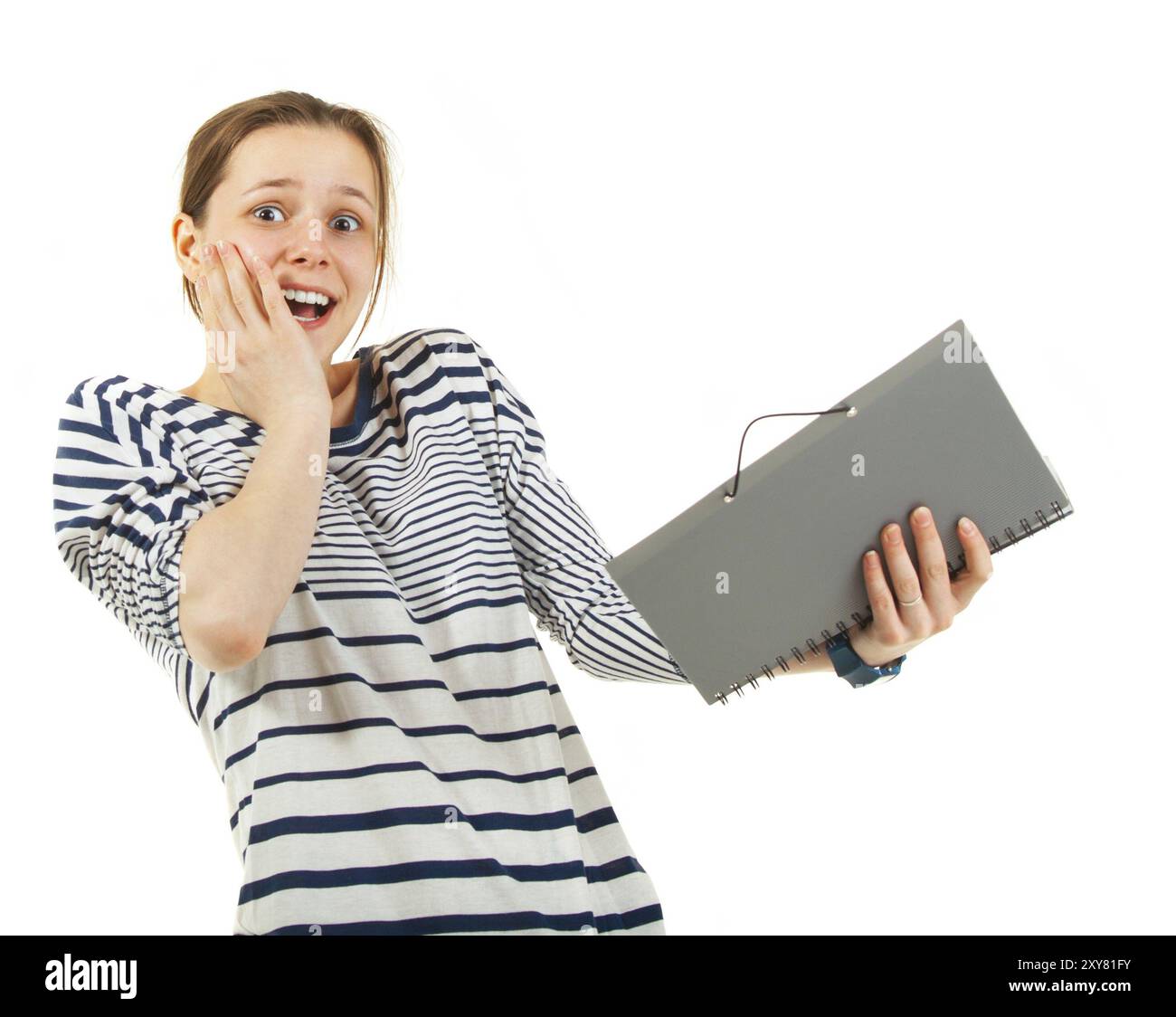 Teenager schoolgirl with textbook isolated on white background Stock ...