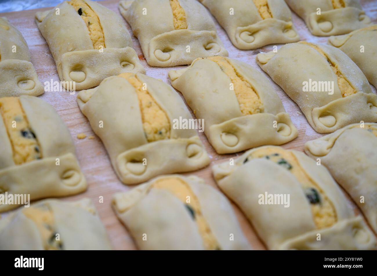 Traditional Cypriot Flaouna delicious Greek Easter Cheese Bread. Flaounes are traditionally prepared for Easter by Orthodox Cypriots. Stock Photo