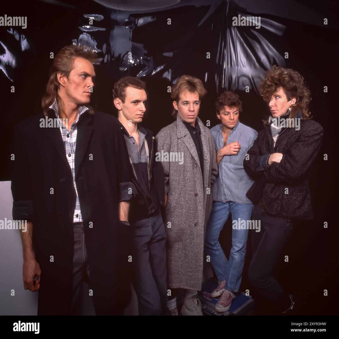 New Rave Bands Five stylish 1980s new wave band members pose in studio with dramatic ...