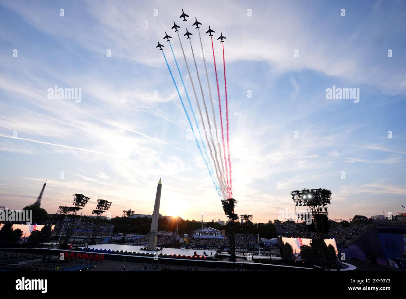 The Patrouille de France fly overhead during the opening ceremony of ...